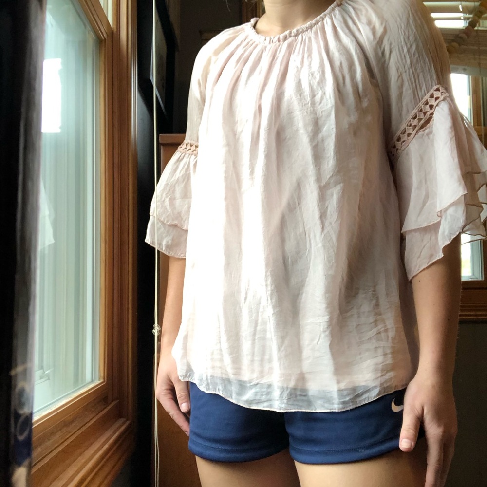 Elena Baldi pink blouse